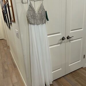 Elegant White and Silver Beaded Gown